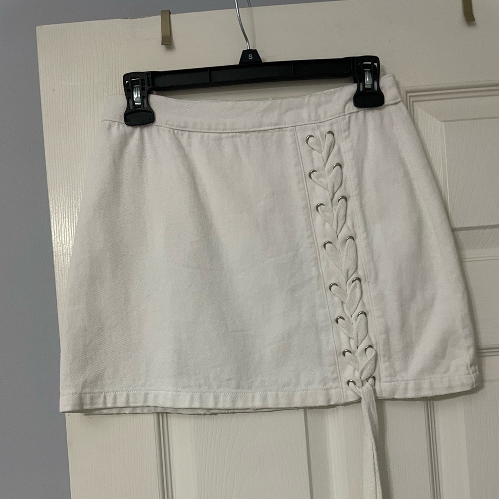 White skirt with lace up detail